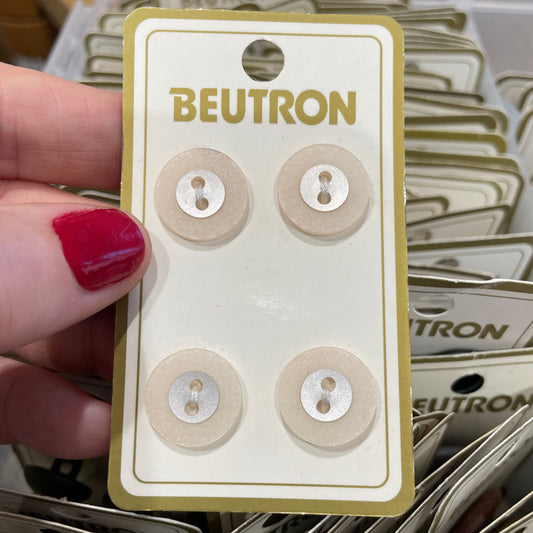 Hand holding a card with buttons and 'Beutron' branding, surrounded by more cards.