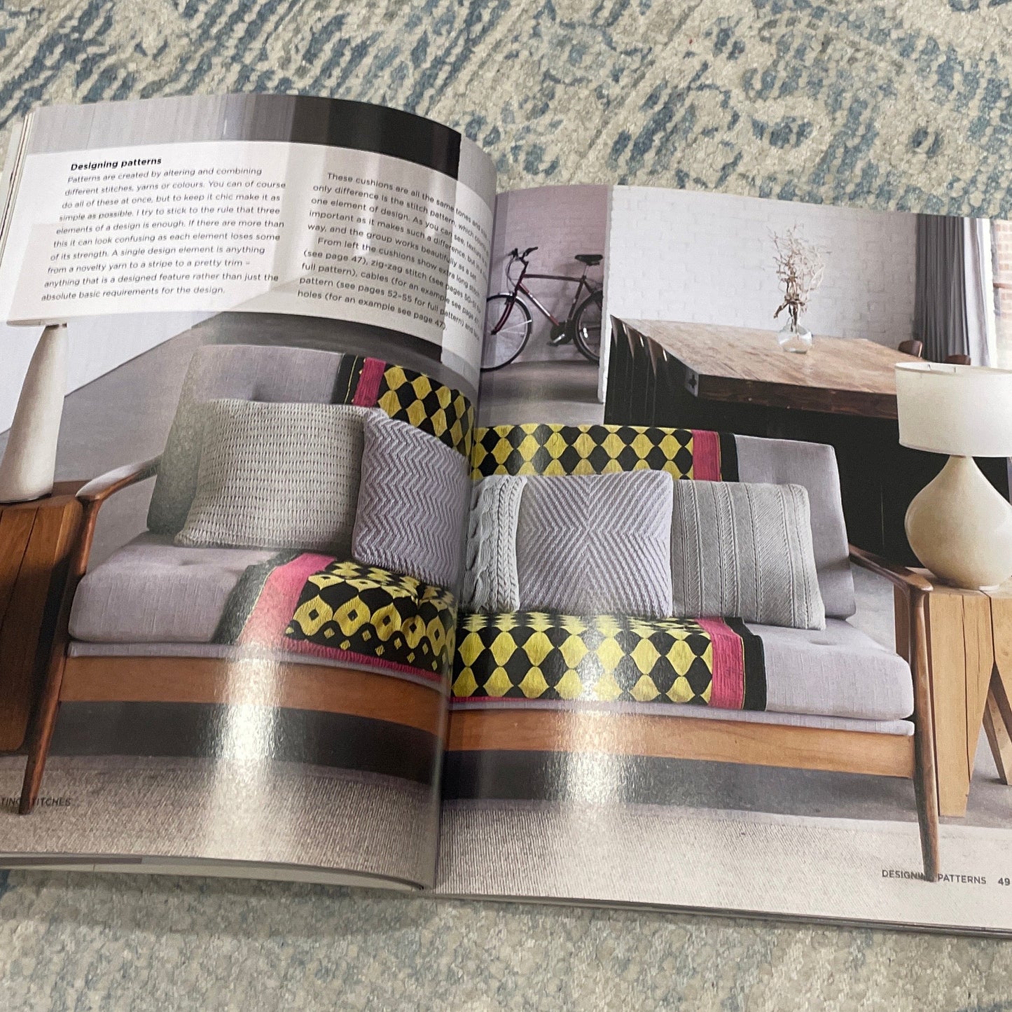 Book on a textured surface with a patterned cover