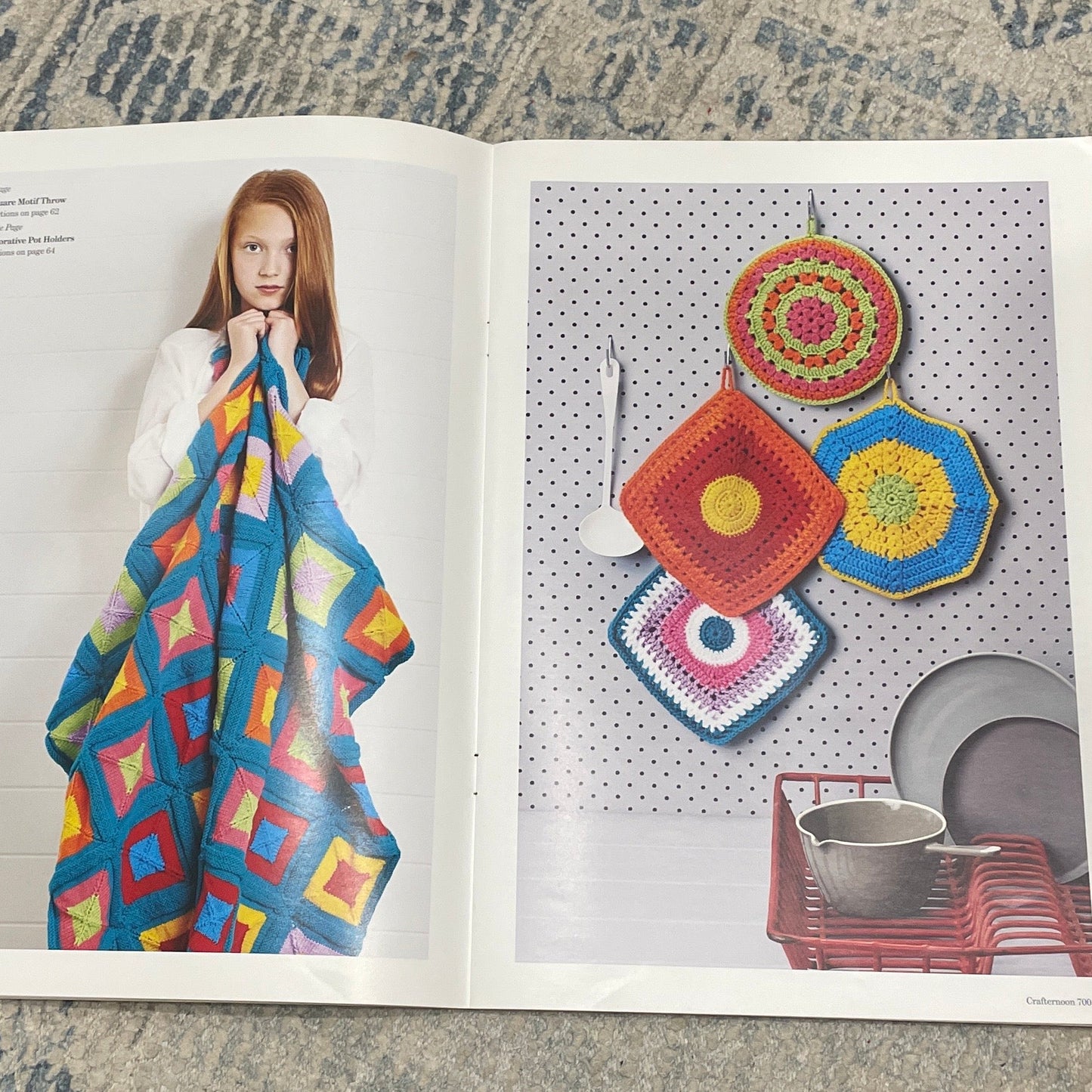Open Crafternoon on a textured surface with colorful patterns