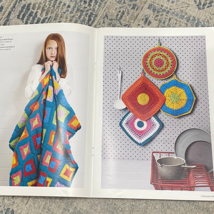 Open Crafternoon on a textured surface with colorful patterns