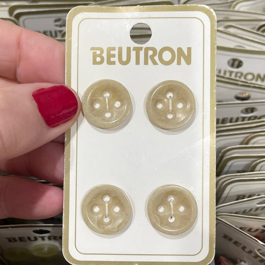 Hand holding a card with buttons and 'Beutron' branding, surrounded by more cards.