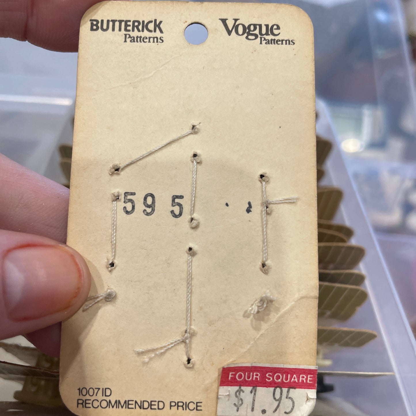 Card held by a hand