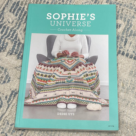 Book titled 'Sophie's Universe' on a textured surface